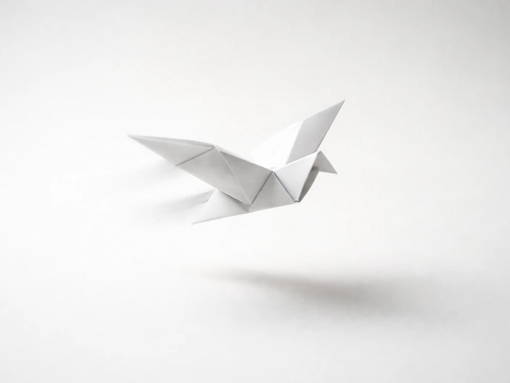 Finished origami paper bird gliding forward with motion blur against a clean light background.